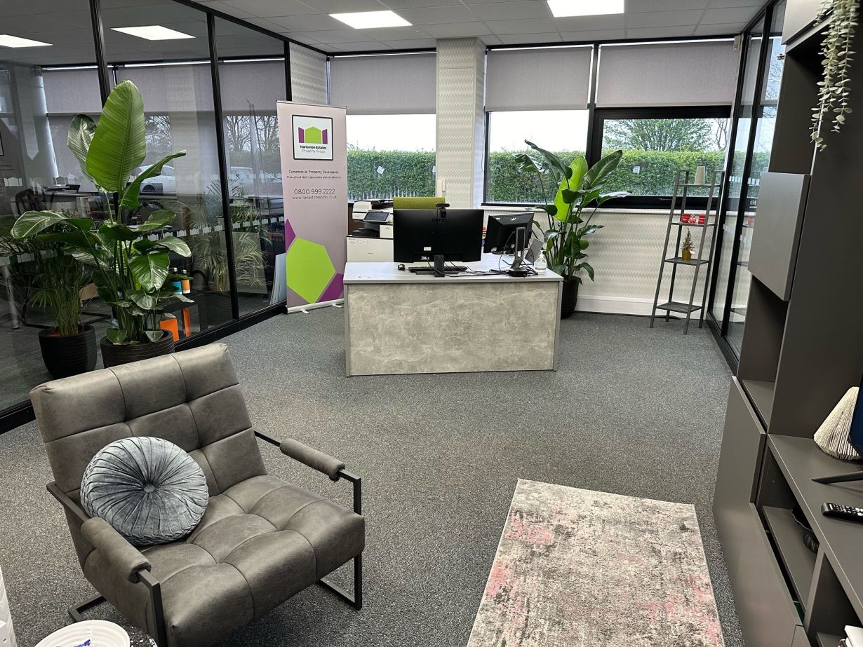 Modern and inviting office reception at Windsor House, featuring lush greenery, contemporary furniture, and ample natural light, ideal for businesses seeking a vibrant and productive workspace in the East Midlands.